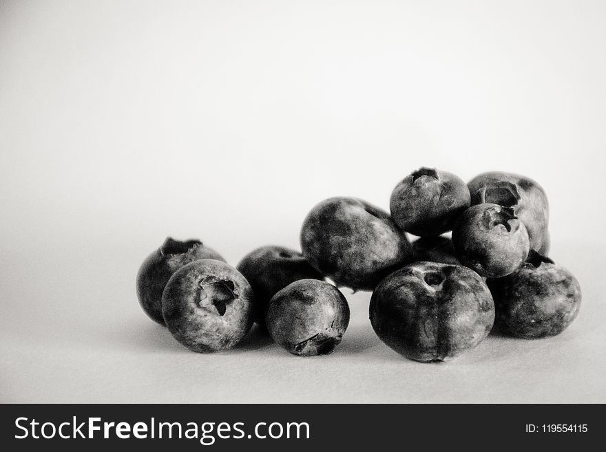 Grayscale Photography of Blueberries