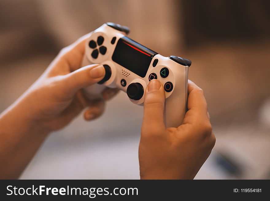 Person Holding Sony Ps4 Controller