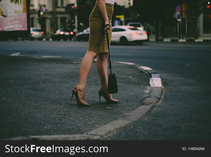 Woman&#x27;s Holding Black Sling Bag