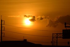 Golden Sunset With Power Poles And Power Lines. Royalty Free Stock Photography