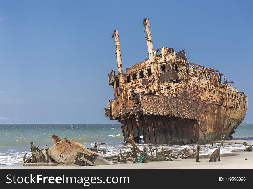Ships cemetery - abandoned ship carcass in the atlantic ocean, Angola, Africa. Ships cemetery - abandoned ship carcass in the atlantic ocean, Angola, Africa