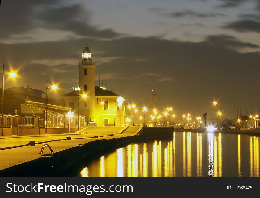 Night view of the lighthouse near the dock. Night view of the lighthouse near the dock