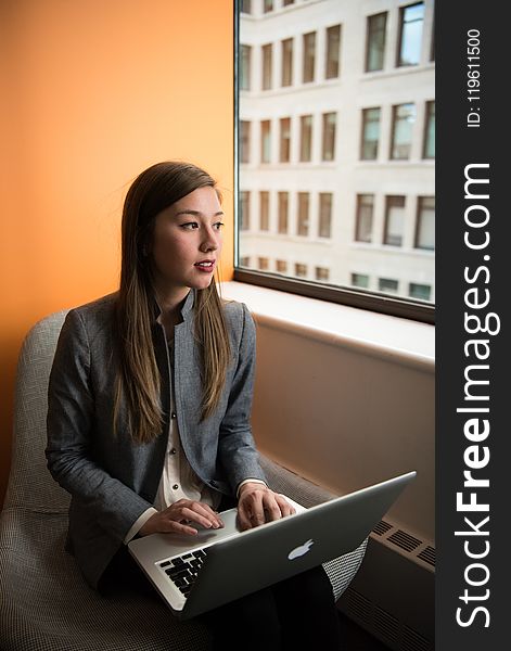 Photography Of Woman Using Laptop