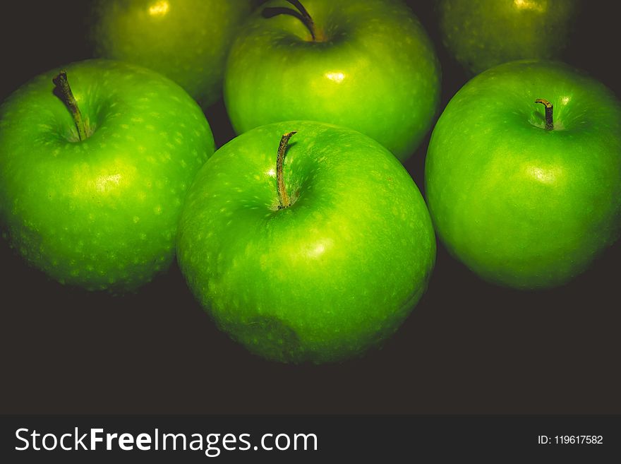 Pile of ripe green apples close up vintage background. Pile of ripe green apples close up vintage background.