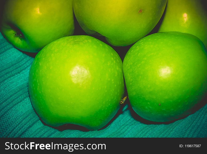 Pile of ripe green apples close up vintage background. Pile of ripe green apples close up vintage background.