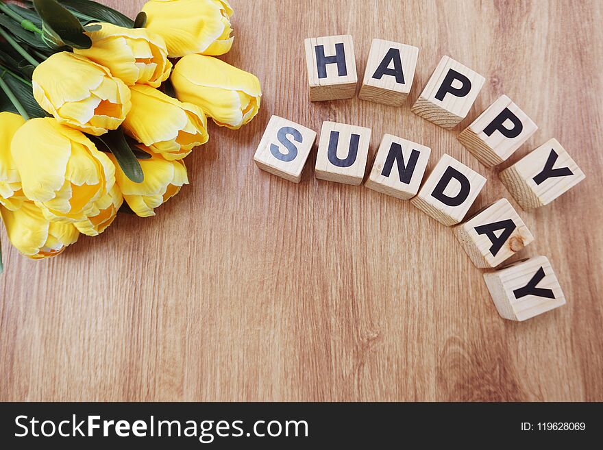 Happy Sunday On Wooden Background