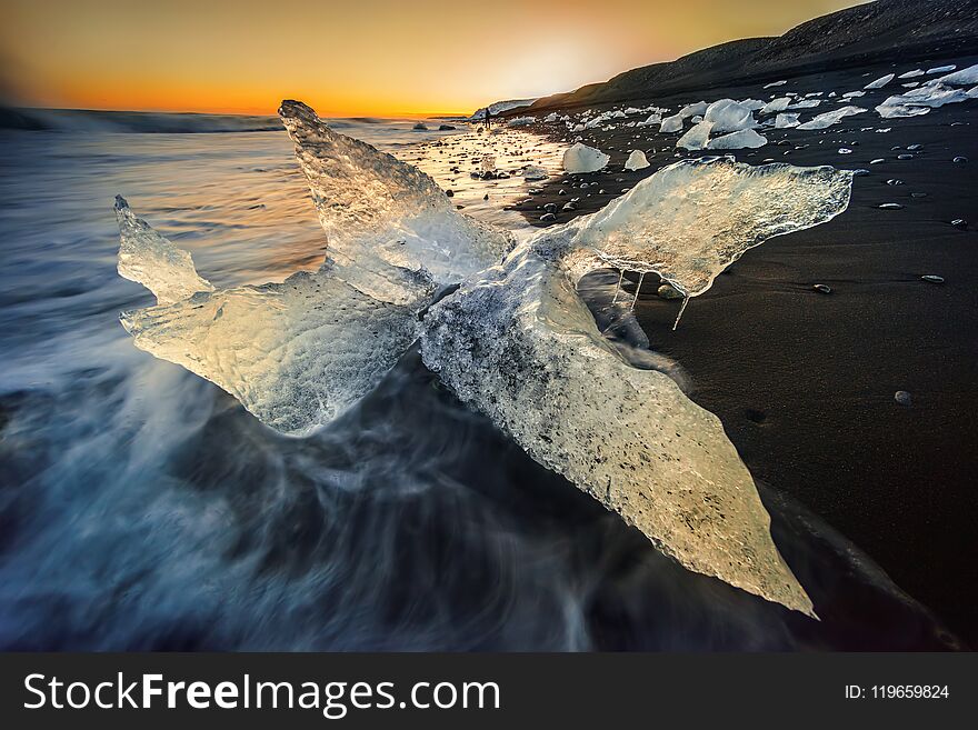 Icebergs in form of monster on Jokulsarlon black beach, Iceland. Icebergs in form of monster on Jokulsarlon black beach, Iceland