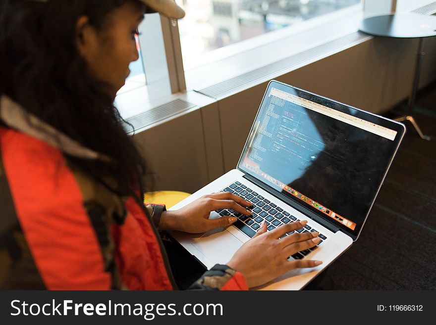 Woman Using Macbook Pro