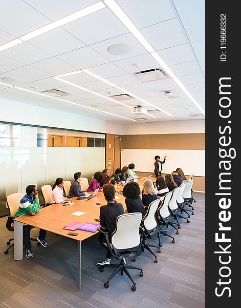 People Having Meeting Inside Conference Room