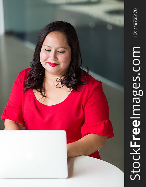 Photography Of Woman Using Laptop