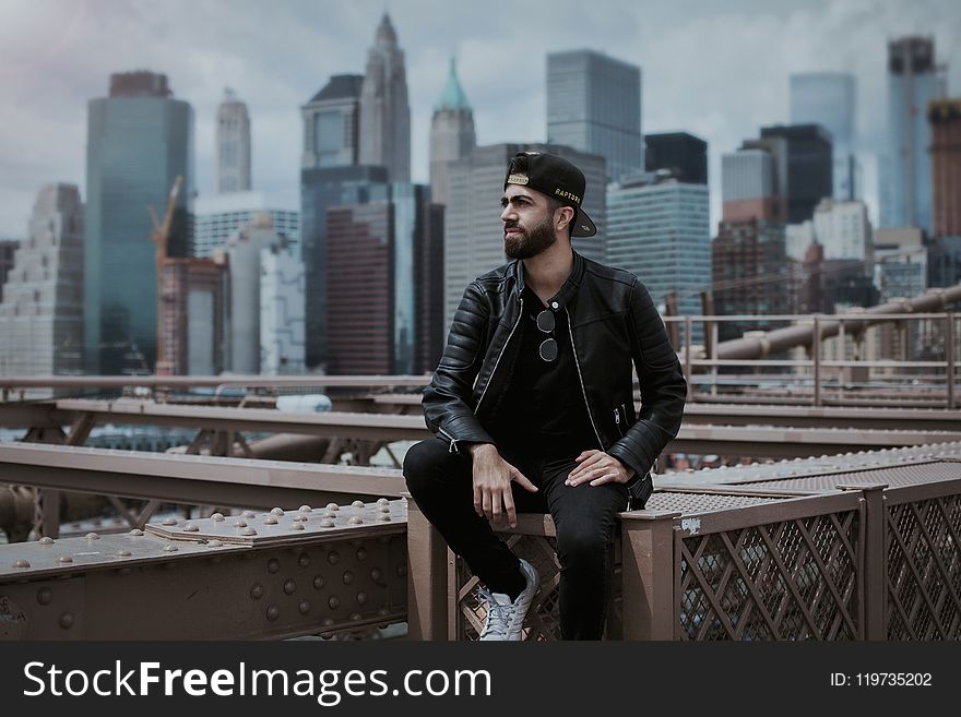 Man Wearing Black Zip-up Leather Jacket