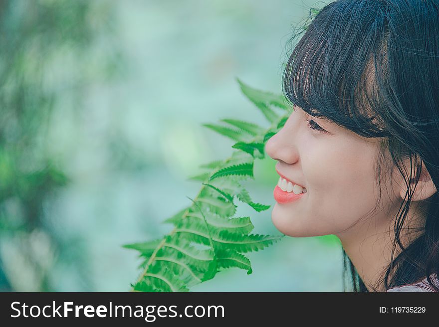 Close-Up Photography of Woman Smiling