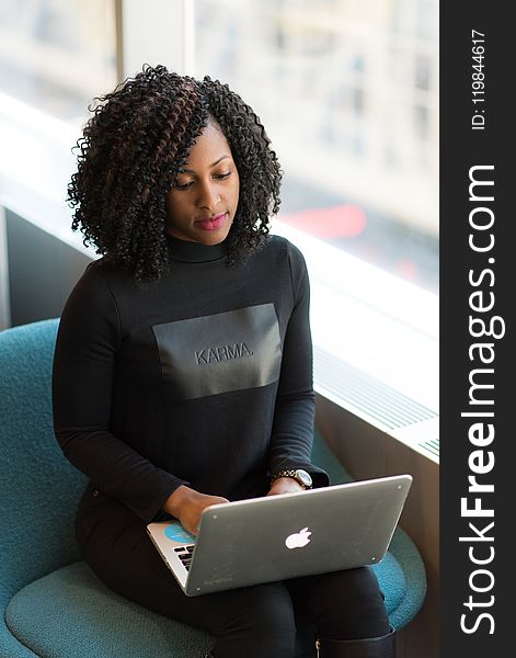 Woman In Black Long-sleeved Shirt Using Laptop