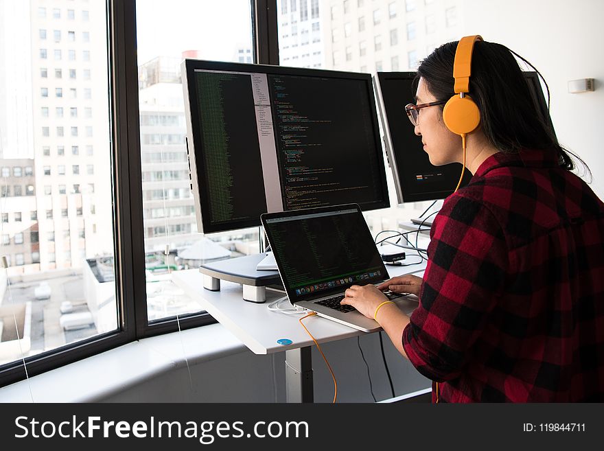 Woman Sitting in Front Laptop