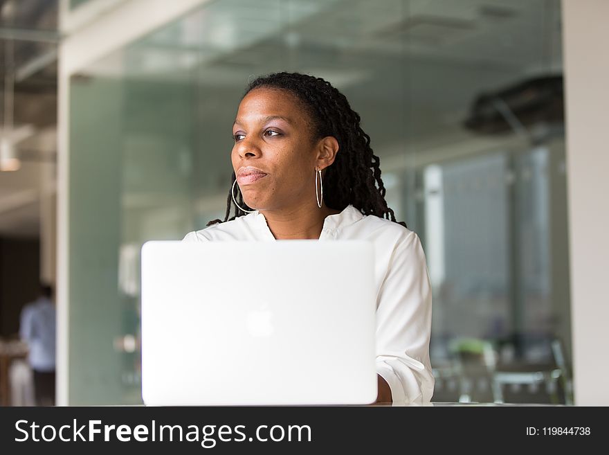 Photography Of Woman Using Laptop