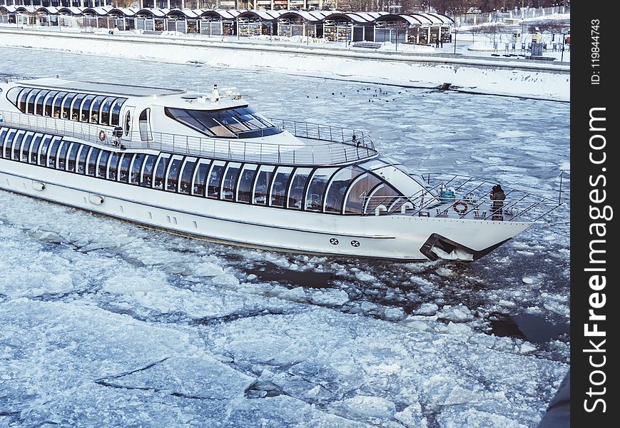 White Cruise Ship On Icy Water