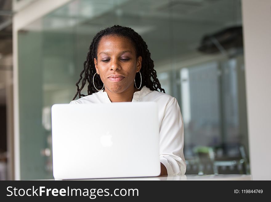 Photography Of Woman Using Laptop