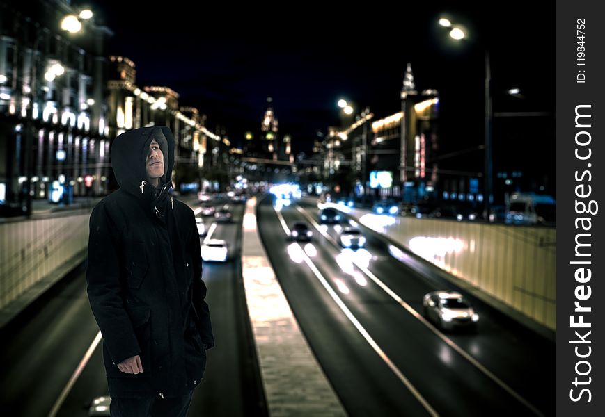 Man Wearing Black Hoodie With Road Background