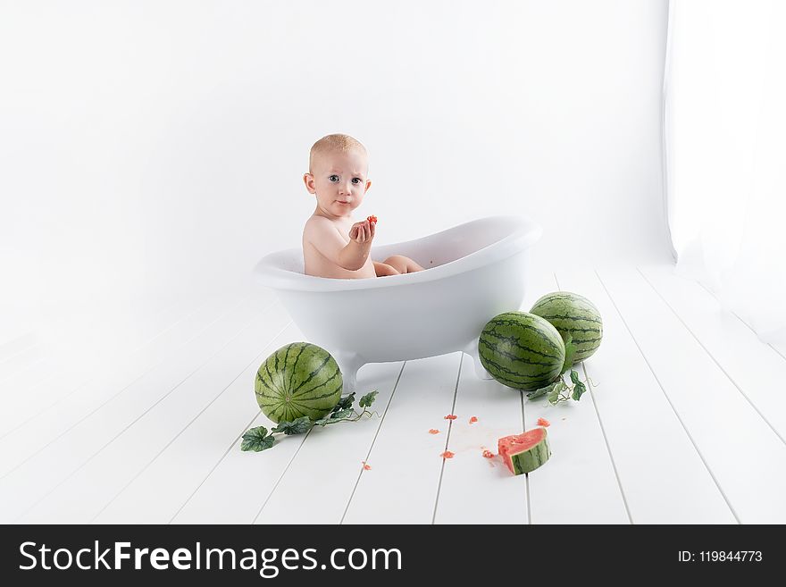 Baby In Bathtub