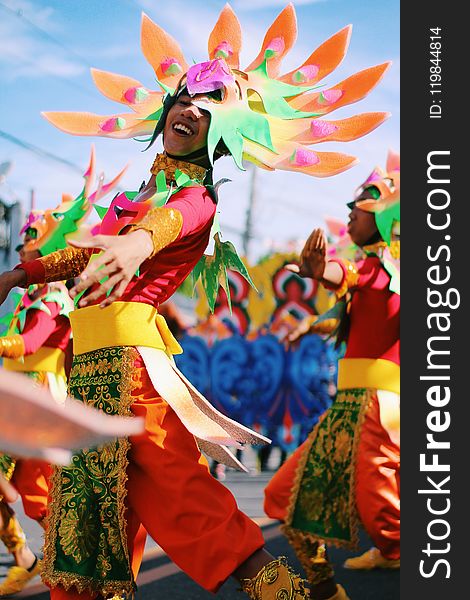 Shallow Focus Photography of Person Wearing Multicolored Costume