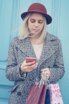 Young Blond Girl Standing On The Street. Young Girl Returns From Royalty Free Stock Images