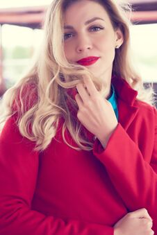 Outdoor Fashion Portrait Of Glamour Young Cheerful Stylish Lady Wearing Trendy Red Coat. Blonde Long Hair. Style Photo Stock Photos Outdoor Fashion Portrait Of Glamour Young Cheerful Stylish Lady Wearing Trendy Red Coat. Blonde Long Hair. Style Photo Stock Photos