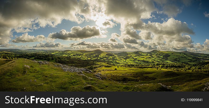 Mountains Under White Clouds