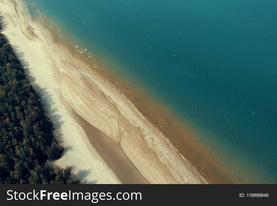 Bird&#x27;s-eye View of Coastline and Sea