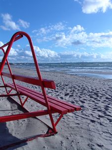 Red Bench On The Beach Royalty Free Stock Images