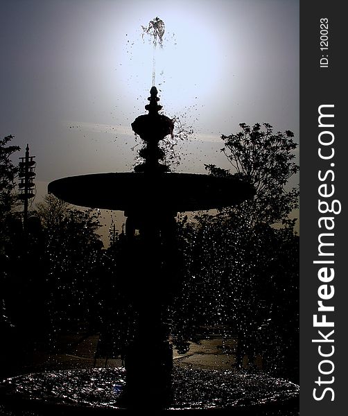 Silhouette of water fountain in the sunset. Silhouette of water fountain in the sunset