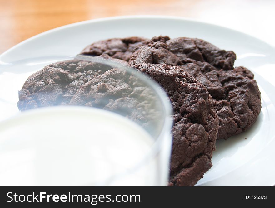 Chocolate chip cookies & a glass of ice cold milk. Chocolate chip cookies & a glass of ice cold milk
