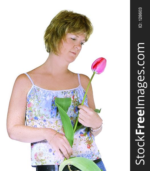 Young woman isolated with a tulip. Young woman isolated with a tulip