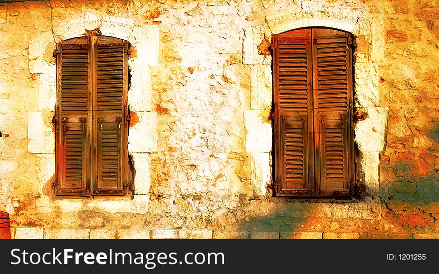 Grungy Pair Of Windows With Shutters