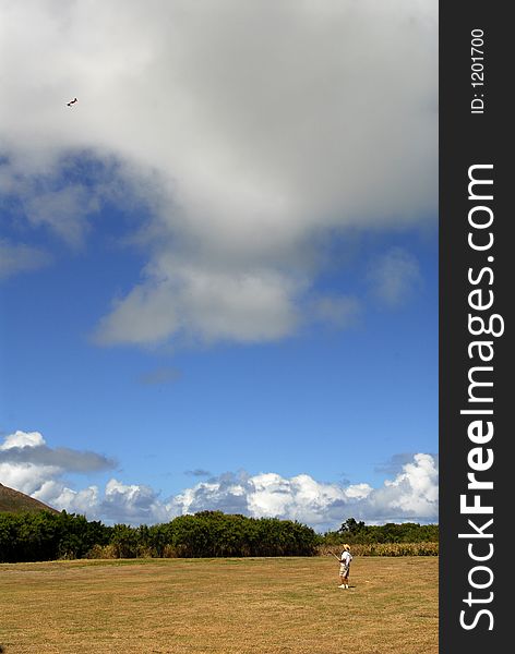 A man flying a model plane