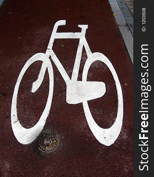 Paint bicycle sign on bike lane. Paint bicycle sign on bike lane