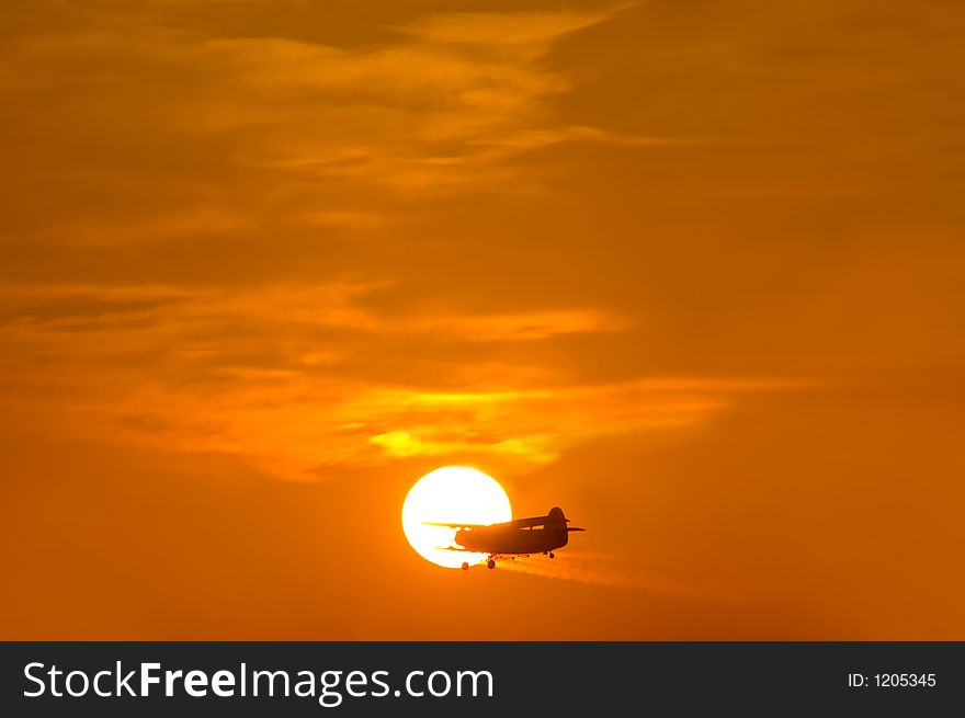 Sunset With Plane