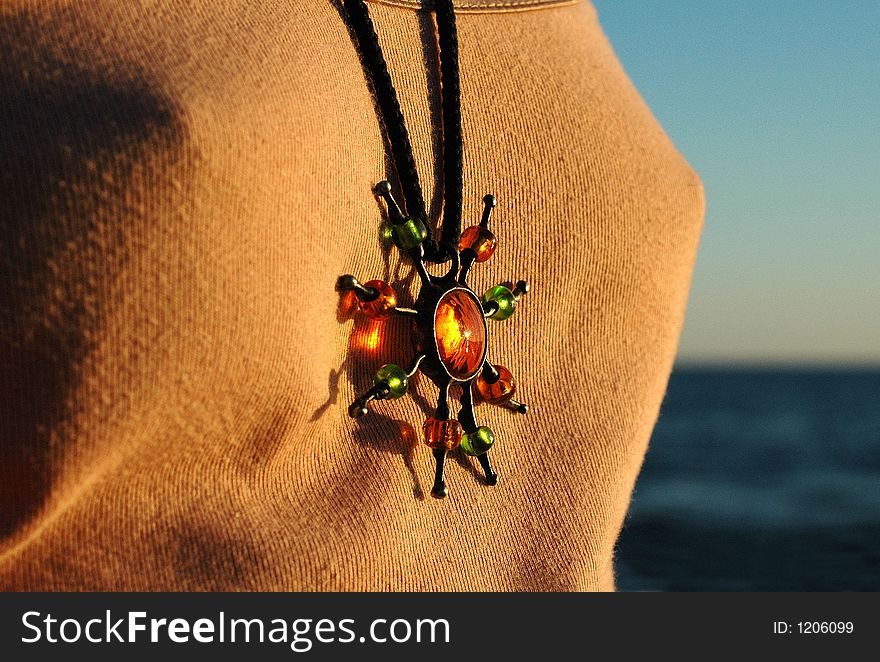 Sun-shaped pendant