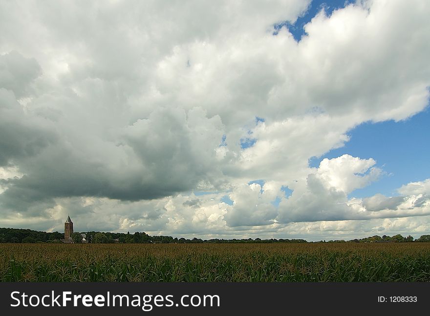 A church in a field on a cloudy day. A church in a field on a cloudy day.