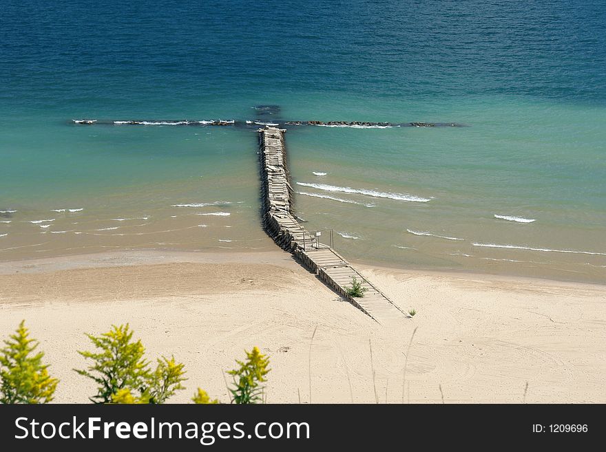 a boardwalk on the beach of Milwaukee lake front. a boardwalk on the beach of Milwaukee lake front.