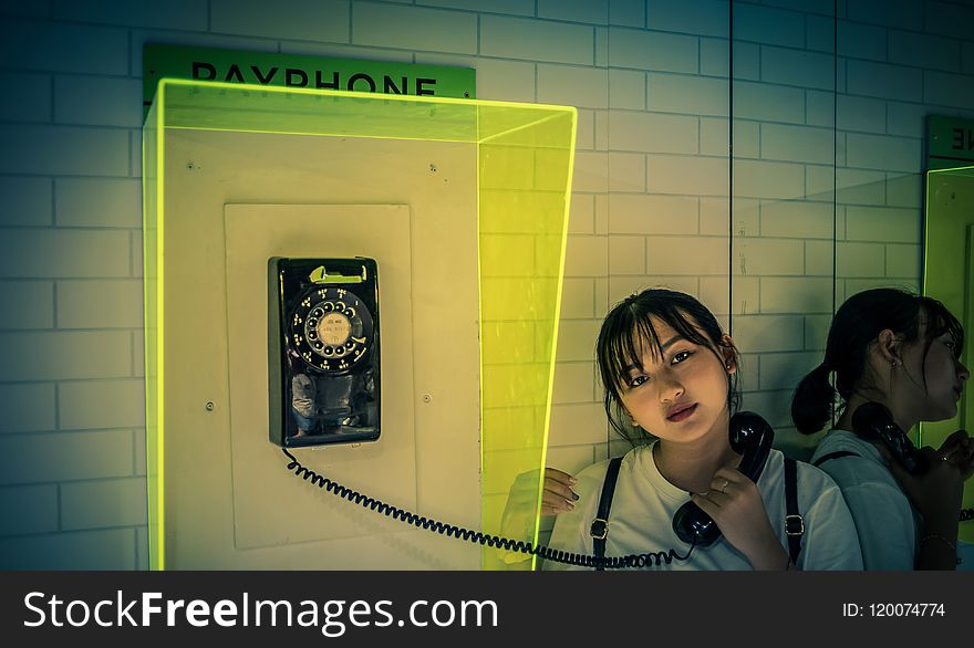 Woman Holding Rotary Telephone