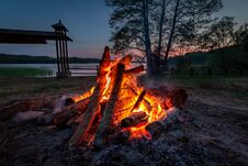 Calm Bonfire At Dusk By The Lake In Summer Royalty Free Stock Photography