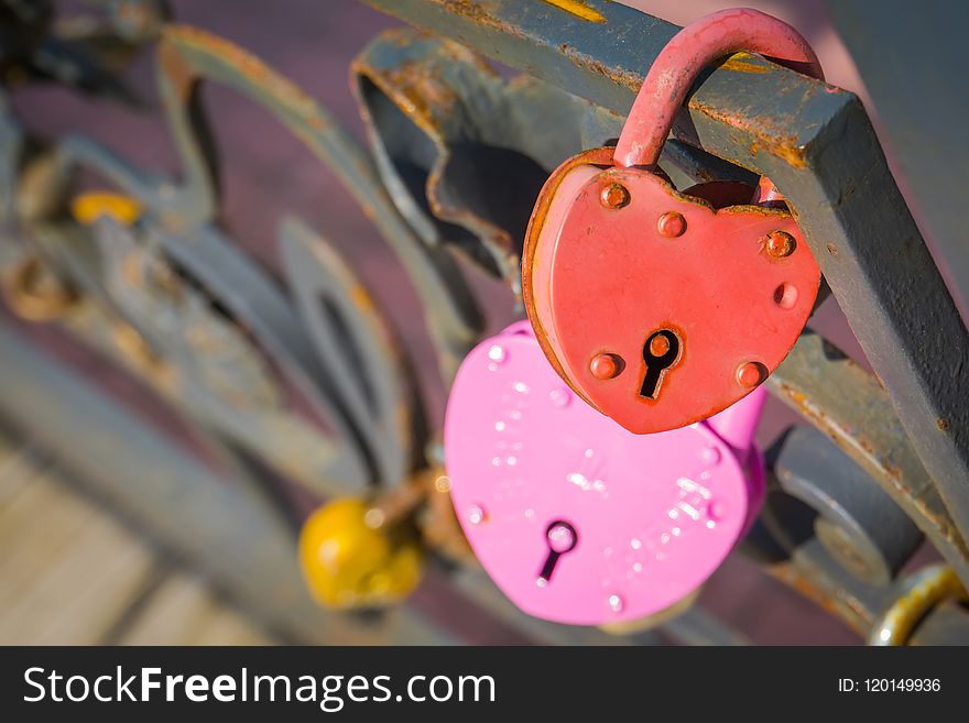 Love locks on a metal wedding bridge close up background. Love locks on a metal wedding bridge close up background.