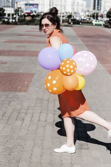 Happy Young Woman With Balloons On The City Square Royalty Free Stock Photos Happy Young Woman With Balloons On The City Square Royalty Free Stock Photos