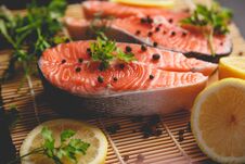 Salmon Steaks With Lemon And Spices Close Up View. Royalty Free Stock Photo Salmon Steaks With Lemon And Spices Close Up View. Royalty Free Stock Photo