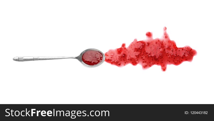 Spoon and sweet raspberry jam on white background