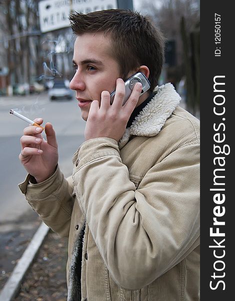Young Smoker On The Phone