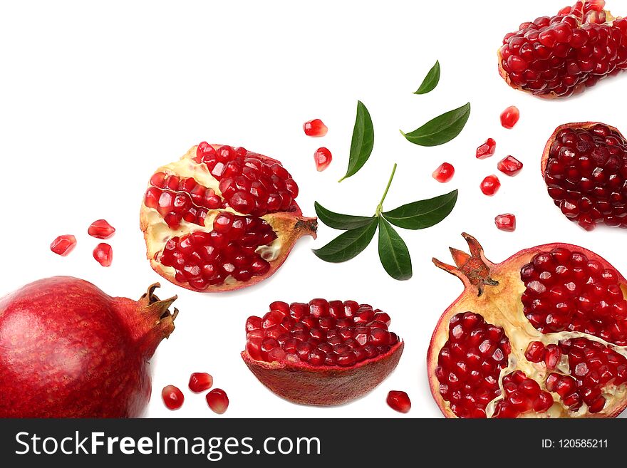 Pomegranate Fruit With Green Leaves Isolated On A White Background Top View