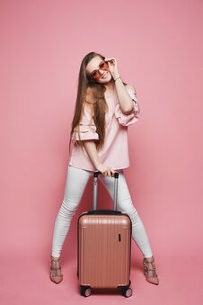 Beautiful Blonde Model Girl In Fashionable Blouse With Naked Shoulders And In Stylish Sunglasses Stands With Suitcase And Posing A Royalty Free Stock Image Beautiful Blonde Model Girl In Fashionable Blouse With Naked Shoulders And In Stylish Sunglasses Stands With Suitcase And Posing A Royalty Free Stock Image