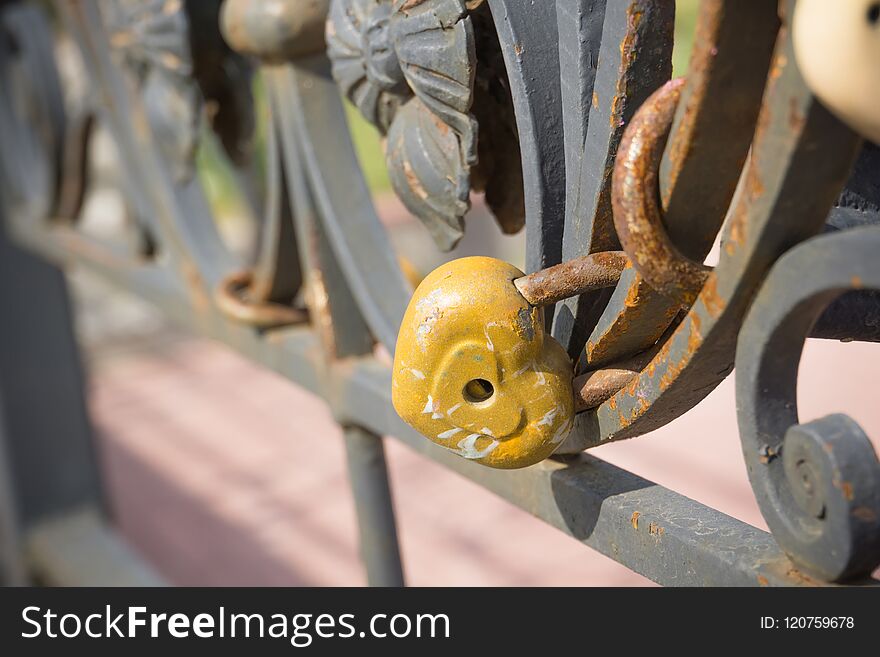 Love locks on a metal wedding bridge close up background. Love locks on a metal wedding bridge close up background.