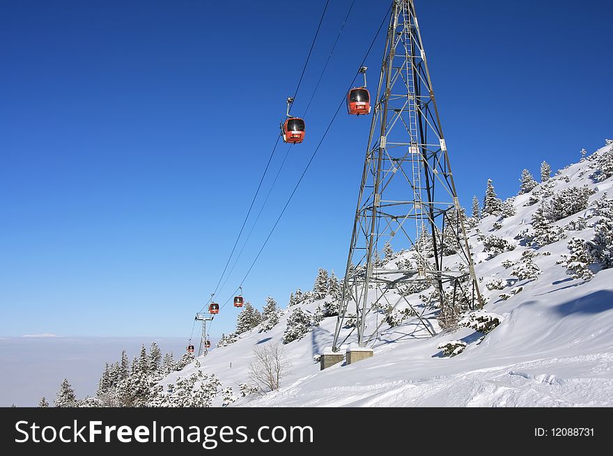Cable car over mountain landscape. Rila mountains, ski resort Borovets, Bulgaria. Cable car over mountain landscape. Rila mountains, ski resort Borovets, Bulgaria